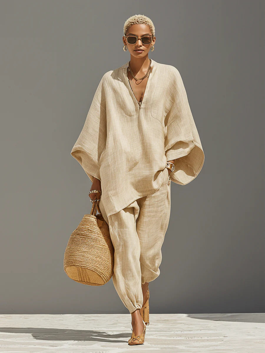 casual-style top with batwing sleeves, V-neck, and relaxed, loose fit